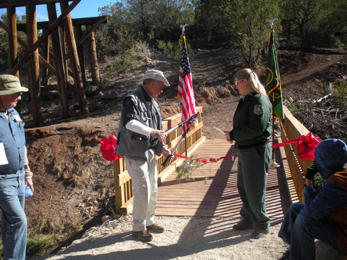 Nicholson and Kelton cutting the ribbon.